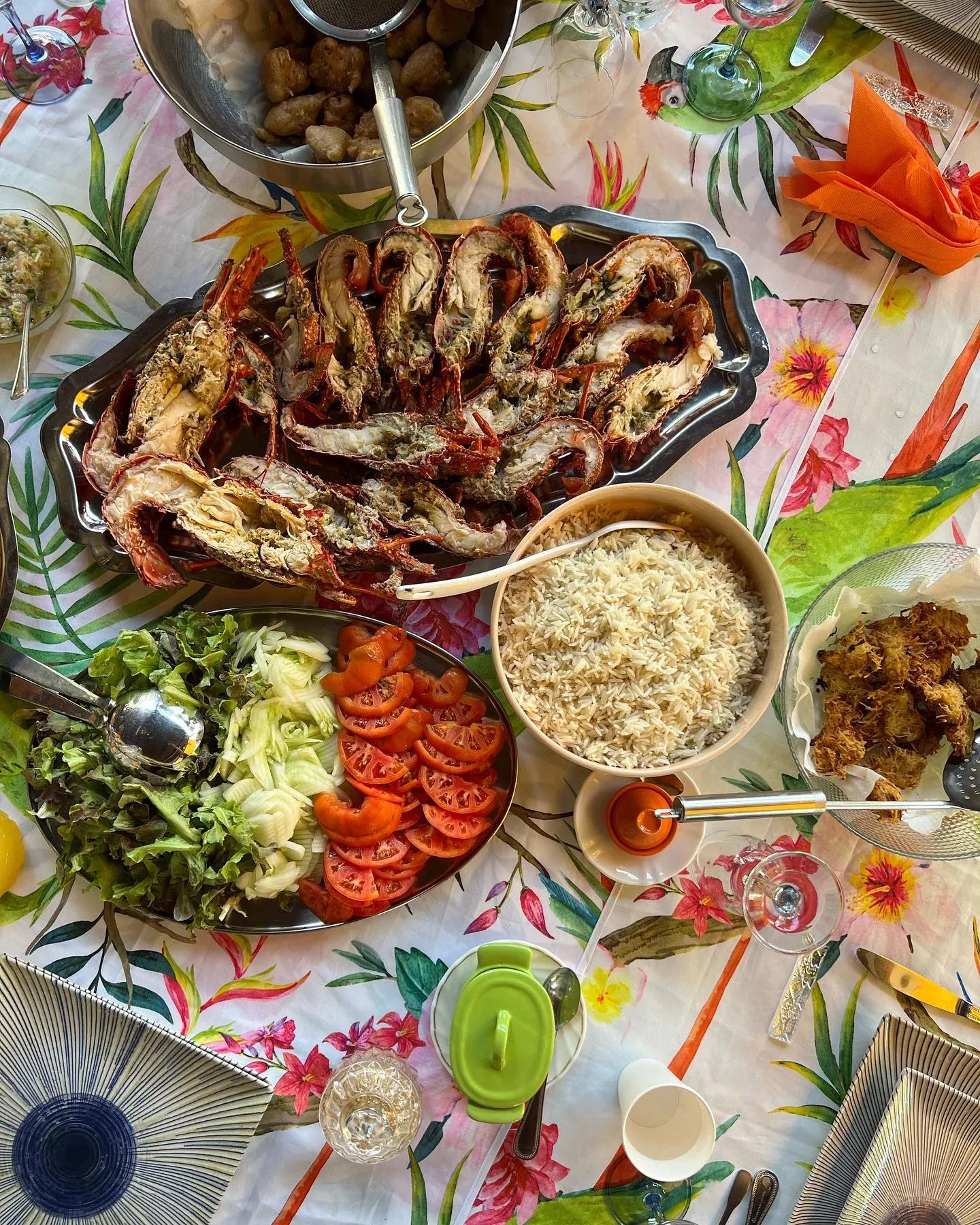 Table laid with seafood and salads, from above